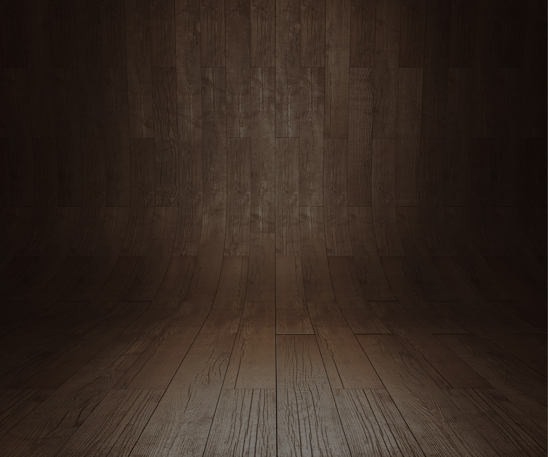 Empty curved wooden floor and backdrop, dark brown tones, studio-style setting